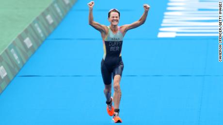 TOKYO, JAPAN - JULY 27:  Flora Duffy of Team Bermuda celebrates winning the gold medal during the Women&#39;s Individual Triathlon on day four of the Tokyo 2020 Olympic Games at Odaiba Marine Park on July 27, 2021 in Tokyo, Japan. (Photo by Cameron Spencer/Getty Images)