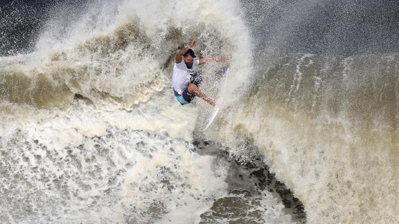 Brazilian surfer Italo Ferreira competes in the gold-medal final on July 27. <a href=