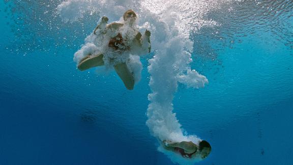 An underwater view shows the United States' Delaney Schnell, left, and Jessica Parratto after a dive in the the synchronized 10-meter platform event on July 27.