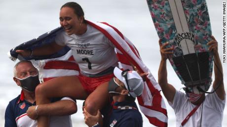 US&#39;s Carissa Moore celebrates after winning the women&#39;s Surfing gold medal final at the Tsurigasaki Surfing Beach, in Chiba, on July 27, 2021, during the Tokyo 2020 Olympic Games.