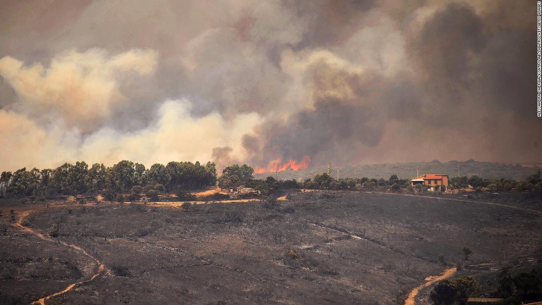 Wildfires scorch Spain and cause 'disaster without precedence' in Sardinia