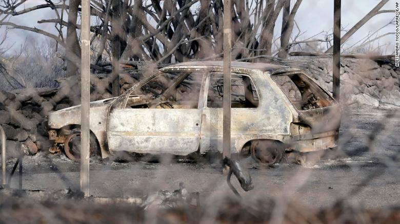 A burned car in Sardinia. The island's government declared an emergency over the weekend.