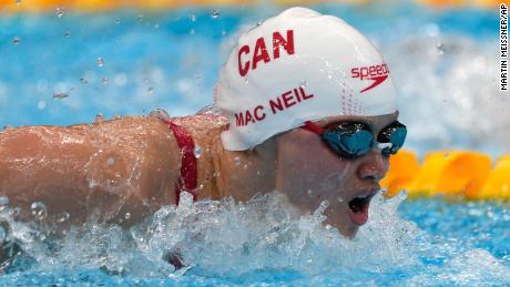 Canada&#39;s Margaret Macneil won the gold medal in the women&#39;s 100-meter butterfly at the Tokyo Olympics.