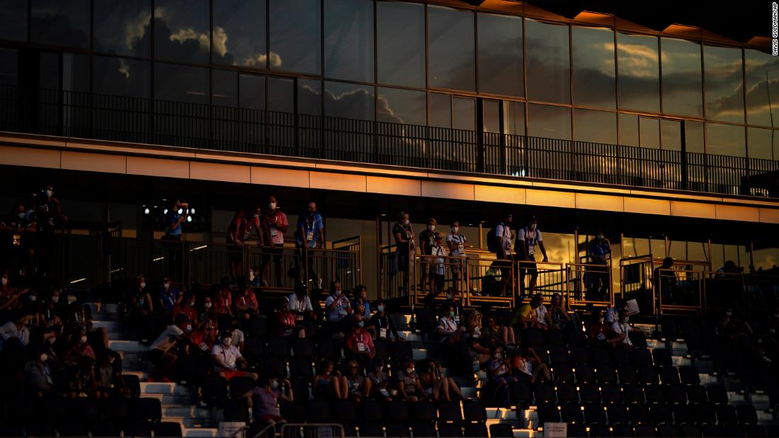 A crowd watches equestrian action on July 28.