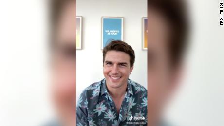 Tom Cruise isn&#39;t really grinning here — it&#39;s a deepfake video posted to TikTok earlier this year.