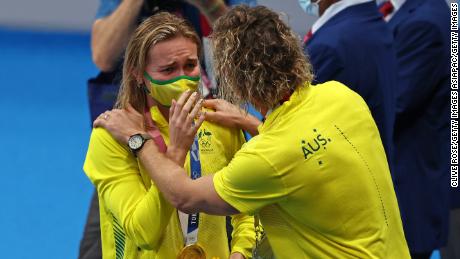 TOKYO, JAPAN - JULY 28: Ariarne Titmus of Team Australia reacts with her coach Dean Boxall of Team Australia after winning the gold medal in the Women&#39;s 200m Freestyle Final on day five of the Tokyo 2020 Olympic Games at Tokyo Aquatics Centre on July 28, 2021 in Tokyo, Japan. (Photo by Clive Rose/Getty Images)