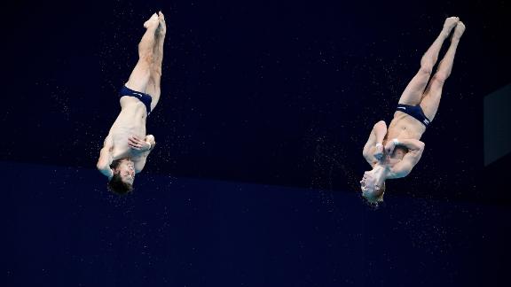 American divers Michael Hixon, left, and Andrew Capobianco compete in the synchronized 3-meter springboard event on July 28. They won silver. China's Wang Zongyuan and Xie Siyi won gold.