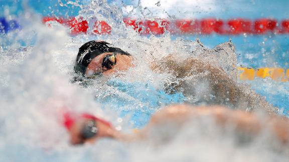 American swimmer Caeleb Dressel, top, competes in the 100-meter freestyle final on July 29. With an <a href=