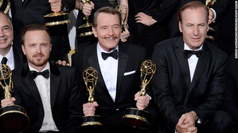 Aaron Paul, Bryan Cranston, and Bob Odenkirk, winners of Outstanding Drama Series for &quot;Breaking Bad,&quot; pose during the 66th Annual Primetime Emmy Awards on August 25, 2014. 