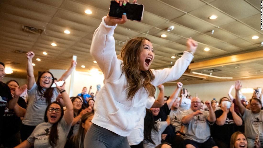 Shyenne Lee, Lee&#39;s sister, celebrates at a watch party in Oakdale, Minnesota.