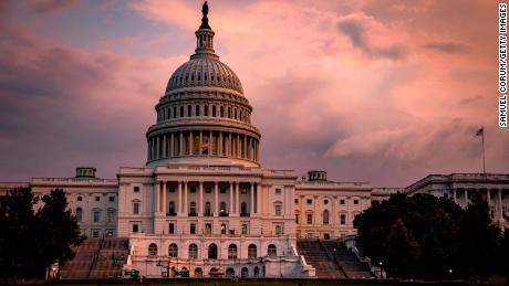 WASHINGTON, DC - JULY 26: The U.S. Capitol Building is seen as the sun sets and a heavy thunderstorm blew through the area on Capitol Hill on July 26, 2021 in Washington, DC. Negotiations over the Infrastructure Bill continue in Congress as the rush to get it passed before their August recess after the initial agreement fell apart. (Photo by Samuel Corum/Getty Images)