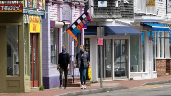 Closed retail stores line the usually crowded Commercial Street, Monday, May 25, 2020, in Provincetown, Mass. (AP Photo/Michael Dwyer)