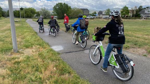 The volunteers ride bikes as well to reach other camp sites.