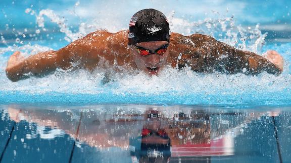 American swimmer Caeleb Dressel competes in the 100-meter butterfly on July 31. He finished in 49.45 seconds, <a href=
