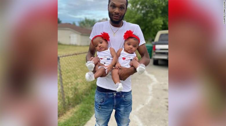 Michigan father rushed into burning home to saves his twin 18-month-old daughters