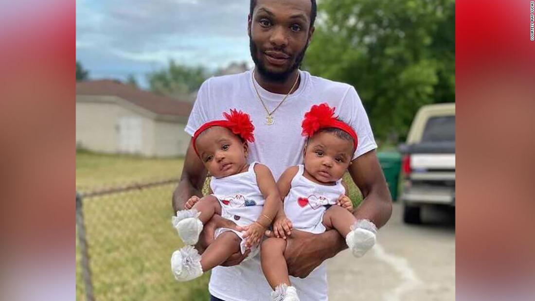 Michigan father rushed into burning home to saves his twin 18-month-old daughters