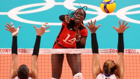 Kenya's Mercy Moim spikes the ball during a volleyball match against the Dominican Republic on July 31.