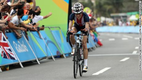 Abbott crosses the finish line of the road race at the 2016 Rio Olympics. 