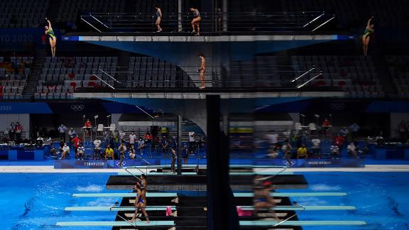 Divers warm up ahead of the women's 3-meter springboard finals on August 1.