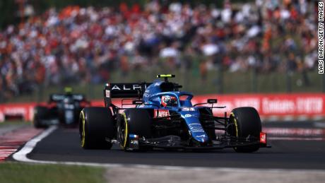 After the race restarted, Alpine&#39;s Ocon defended his lead from Aston Martin&#39;s Sebastian Vettel to claim the first F1 victory of his career.
