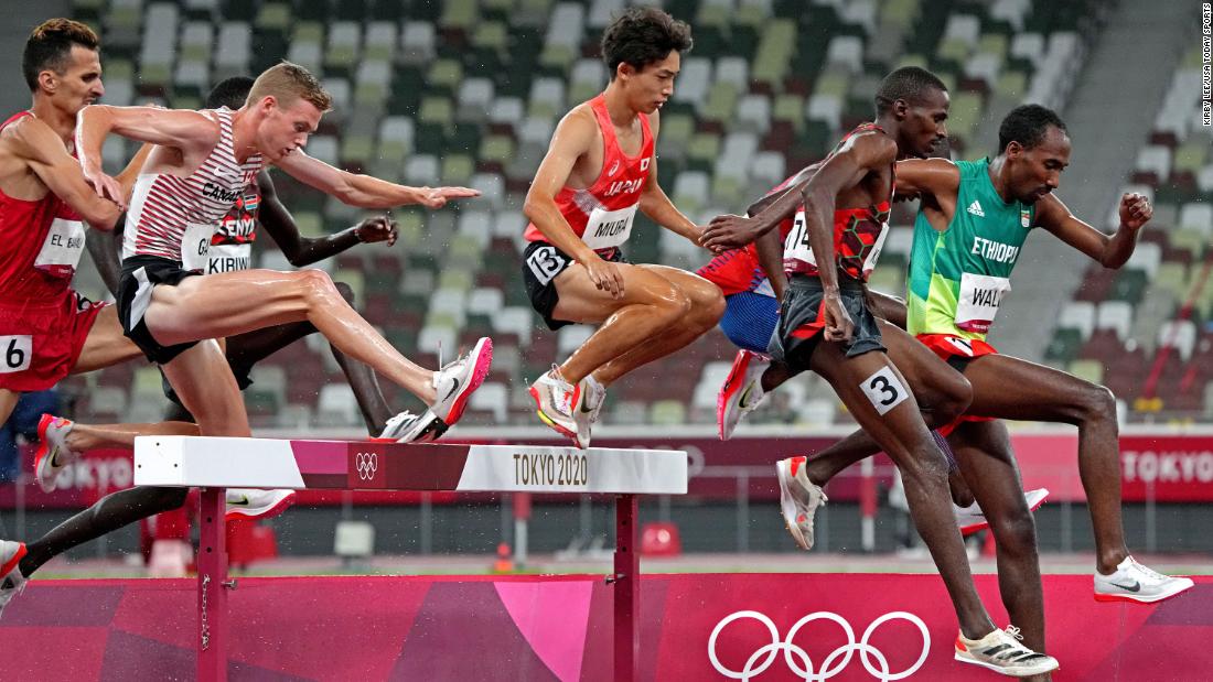 Runners compete in the 3,000-meter steeplechase on August 2.