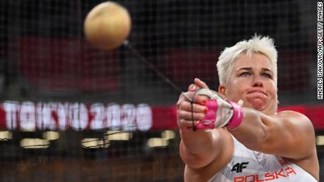 Poland&#39;s Anita Wlodarczyk competes in the women&#39;s hammer throw final during the Tokyo 2020 Olympic Games at the Olympic Stadium in Tokyo on August 3, 2021. 