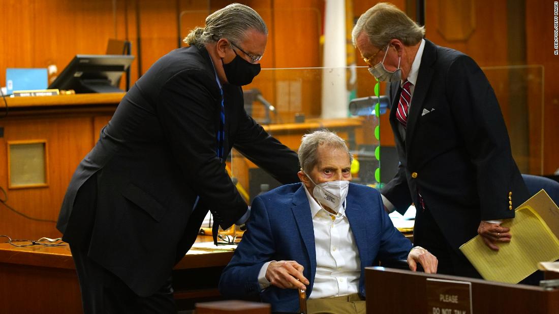 Defense attorneys Dick DeGuerin, right, and David Z. Chesnoff adjust Robert Durst&#39;s wheelchair as attorneys begin opening statements in his murder trial at Inglewood Courthouse on May 18, 2021.