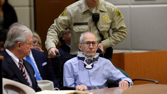 Durst arrives in a wheelchair for his arraignment on capital murder charges related to the death of Susan Berman, on November 7, 2016, in Los Angeles.