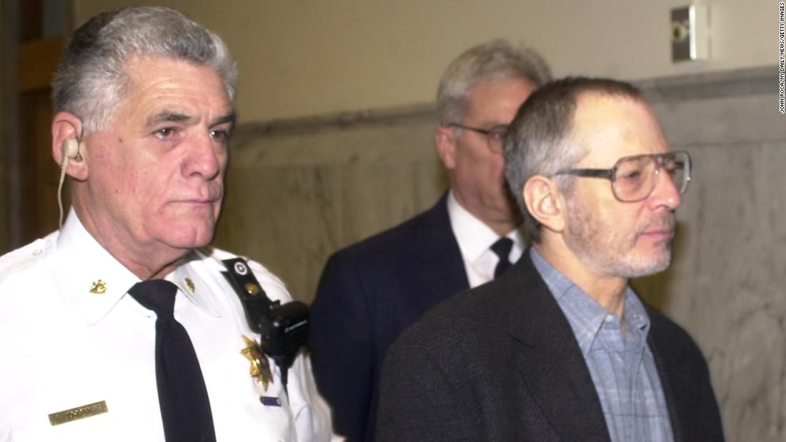 Durst is escorted from Northampton County Courthouse in Easton, Pennsylvania, in 2002.