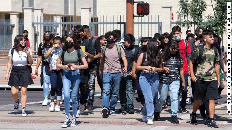 Students leave after their first day at Central High School in Phoenix on August 2, 2021.
