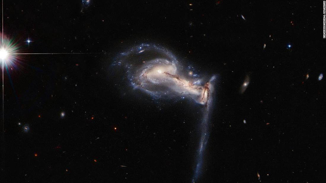 Hubble captured an image of three galaxies in a tug-of-war millions of light-years from Earth. This system is known as Arp 195 and was included in the &lt;a href=&quot;https://ned.ipac.caltech.edu/level5/Arp/paper.pdf&quot; target=&quot;_blank&quot;&gt;Atlas of Peculiar Galaxies&lt;/a&gt;.