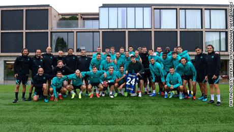 Eriksen with Inter teammates and staff at Appiano Gentile.