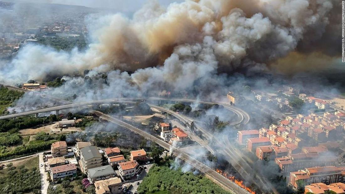 A handout photo from the Italian National Fire Brigade shows an aerial view of a fire in the Pineta Dannunziana reserve in Pescara, Italy, on August 1.