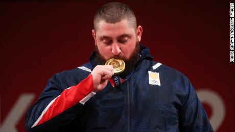 Gold medalist Lasha Talakhadze of Team Georgia poses with the gold medal during the medal ceremony for the Weightlifting - Men&#39;s 109kg+ Group on day 12 of the Tokyo 2020 Olympic Games.