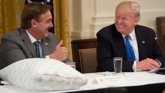 President Donald Trump speaks alongside MyPillow CEO Mike Lindell, during a 