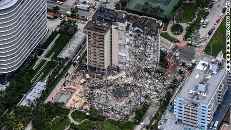 Search and rescue personnel work in the hours after the partial collapse of the Champlain Towers South in Surfside, Florida, on June 24, 2021.