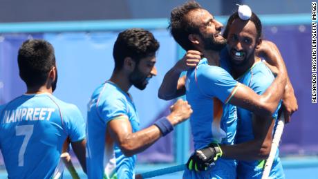 Harmanpreet Singh celebrates scoring their third goal with teammates during the men&#39;s bronze medal match. 