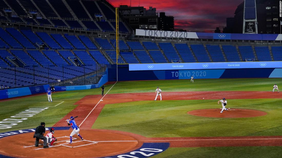 The United States&#39; Joe Ryan pitches to South Korea&#39;s Park Hae-min during a semifinal baseball game on August 5. The Americans won 7-2 to clinch a spot in the final against Japan.