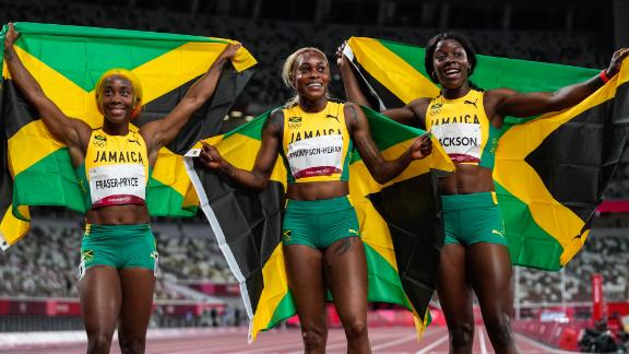 From left, Jamaican sprinters Shelly-Ann Fraser-Pryce, Elaine Thompson-Herah and Shericka Jackson celebrate after <a href=