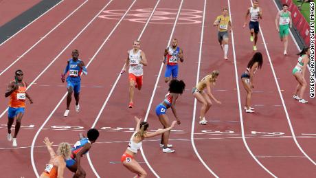 Athletes compete in the mixed 4x400m relay final during the Tokyo 2020 Olympic Games at the Olympic Stadium in Tokyo on July 31.