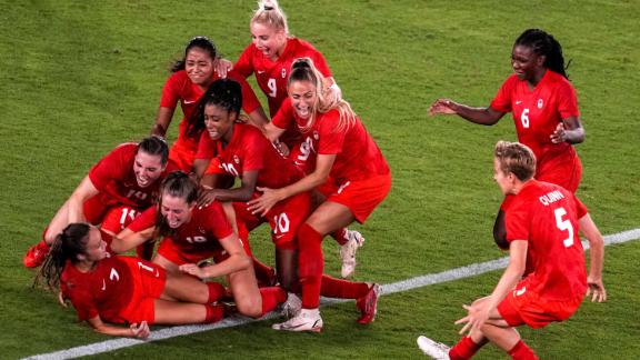 Teammates mob Canada's Julia Grosso after she scored the winning penalty in the shootout against Sweden on August 6. The gold-medal match was tied 1-1 after extra time, so a shootout had to decide the winner. It is <a href=