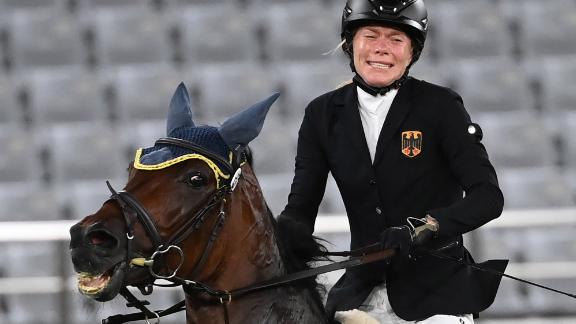 Germany's Annika Schleu was leading the modern pentathlon after two events. But in the show jumping event on August 6, her horse, Saint Boy, refused to cooperate with her wishes. The horse just wouldn't jump, and <a href=