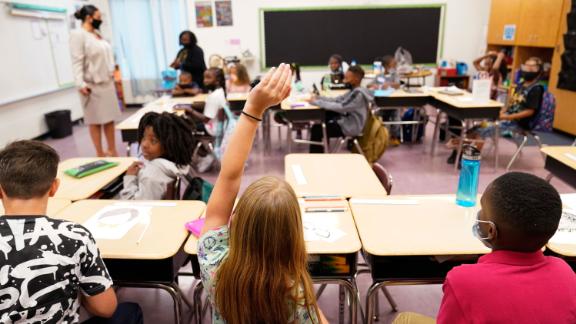 Students at Tussahaw Elementary School  in McDonough, Georgia, on August 4, 2021.  Schools have begun reopening in the US, with most states leaving it up to local schools to decide whether to require masks. 