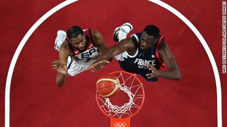 Durant and France&#39;s Moustapha Fall go for a rebound.