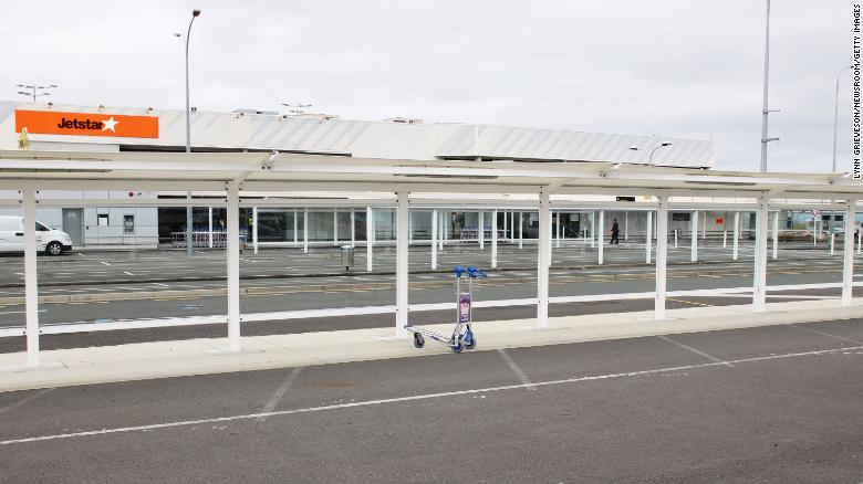 An abandoned luggage trolley in front of the Jetstar terminal at Auckland Airport domestic terminal on October 7, 2020, two days before the lifting of restrictions for the Auckland region that were put in place following the re-emergence of Covid-19 in the community.