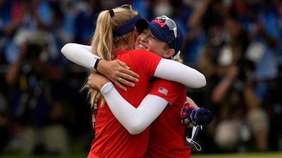 The United States' Nelly Korda, right, is congratulated by her sister, Jessica, after <a href=