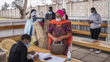 People register for a Covid-19 vaccine at a Nairobi hospital. Less than 2% of Kenya&#39;s population is fully vaccinated, and the country is struggling to get more doses.
