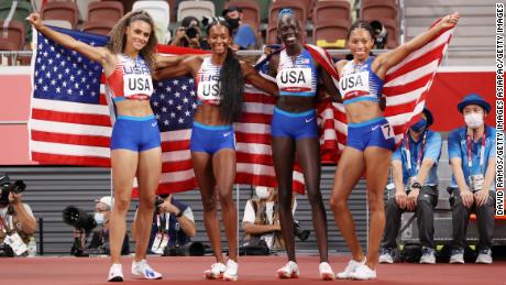 Team USA celebrates the relay win at Tokyo 2020.