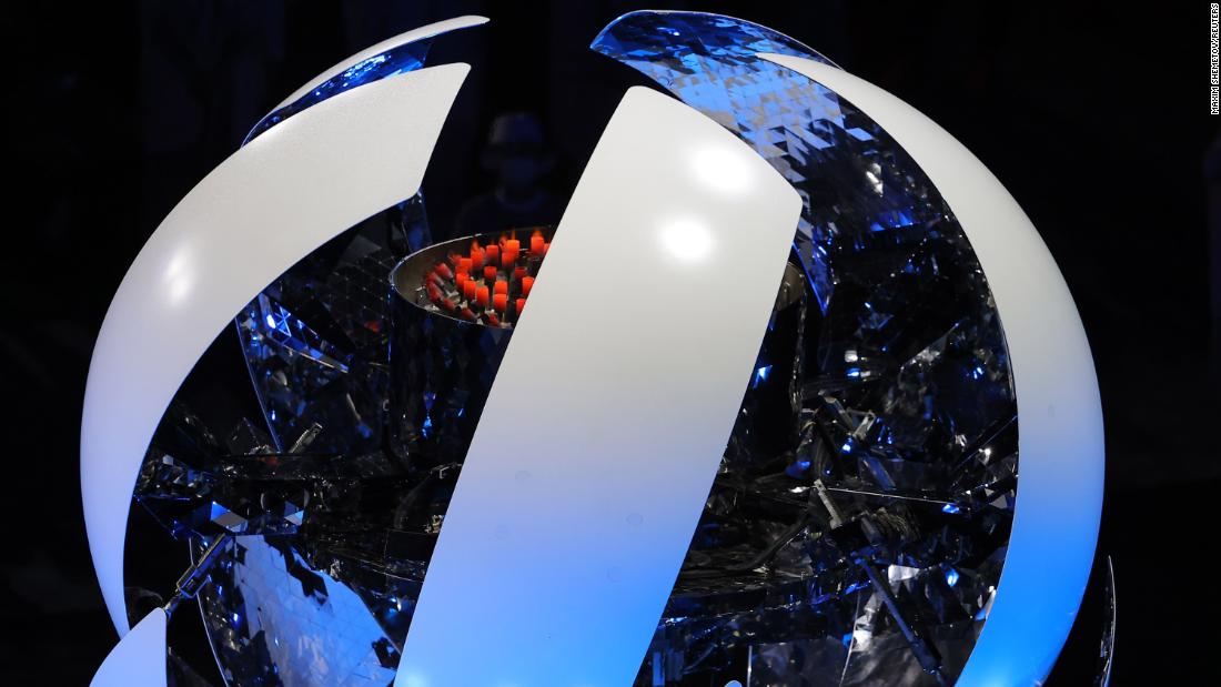 The Olympic cauldron closes, extinguishing the Olympic flame at the end of the closing ceremony.