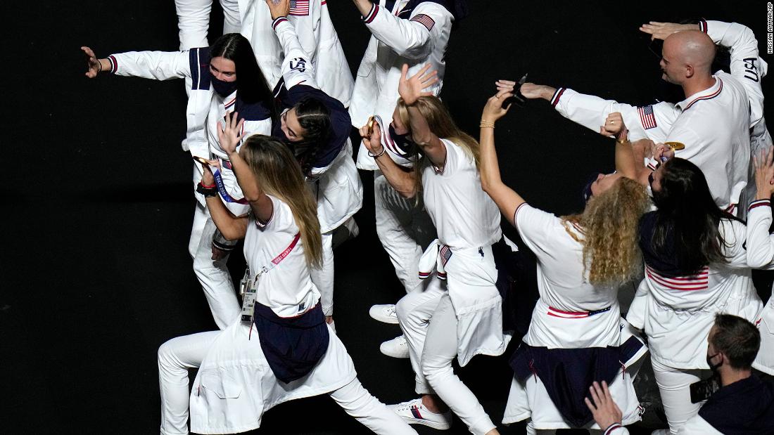 American athletes show their medals to a video camera at the closing ceremony. &lt;a href=&quot;https://www.cnn.com/2021/08/08/sport/olympics-usa-most-medals/index.html&quot; target=&quot;_blank&quot;&gt;The United States finished on top of the medal table&lt;/a&gt; for the third straight Summer Olympics, winning 39 gold medals and 113 medals in all. Second-place China finished with 38 golds and 88 medals in all. Host nation Japan had a third-best 27 golds and won a total of 58 medals.